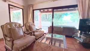 Spacious living room with fireplace in luxury apartment Santa Ponsa Mallorca