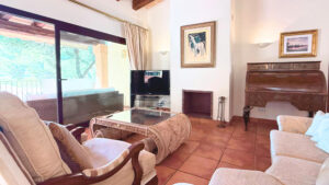 Spacious living room with fireplace in luxury apartment Santa Ponsa Mallorca