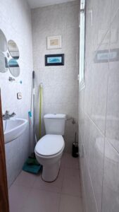 Spacious duplex for renovation in Sol de Mallorca featuring bright interiors, private rooftop terrace, communal pool, large garage, and prime location near beaches, golf courses, international schools, and luxury marinas.