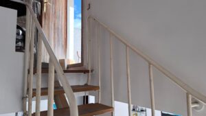 Spacious duplex for renovation in Sol de Mallorca featuring bright interiors, private rooftop terrace, communal pool, large garage, and prime location near beaches, golf courses, international schools, and luxury marinas.