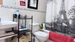 Spacious duplex for renovation in Sol de Mallorca featuring bright interiors, private rooftop terrace, communal pool, large garage, and prime location near beaches, golf courses, international schools, and luxury marinas.