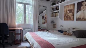 Spacious duplex for renovation in Sol de Mallorca featuring bright interiors, private rooftop terrace, communal pool, large garage, and prime location near beaches, golf courses, international schools, and luxury marinas.